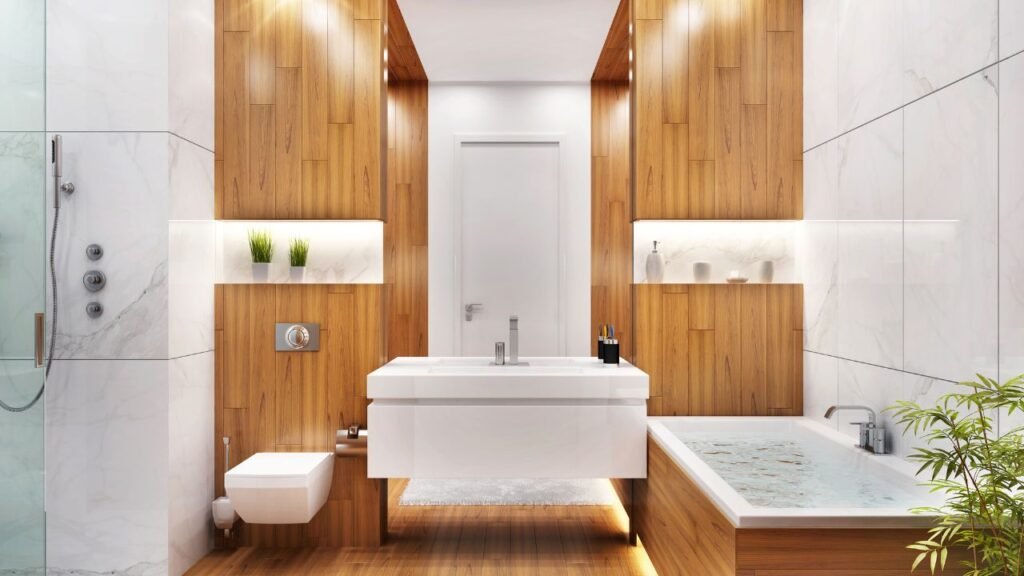 Minimalist bathroom decorations with a round white vessel sink, gold vase, and matching bath accessory set
