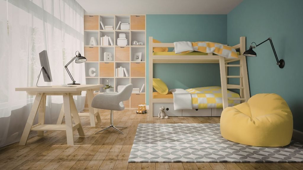 Children's small bedroom with a bunk bed, labeled cube storage shelving, and a compact desk making the most of vertical space