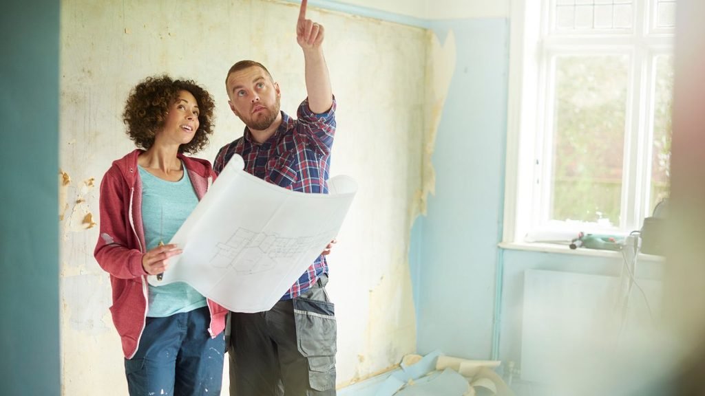 Bathroom remodel ideas for a master bathroom: freestanding tub, glass walk-in shower and cherry wood makeup vanity