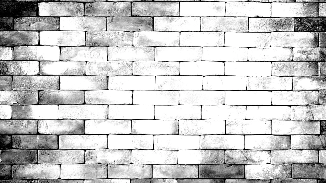 Classic white-washed brick texture demonstrating modern wallpaper for wall designs and urban aesthetics.