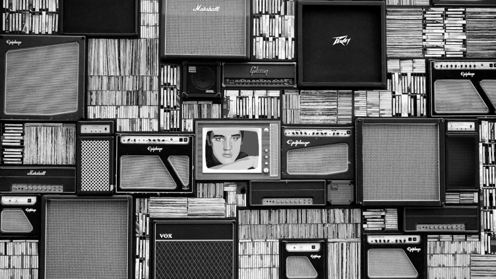 Vintage music-themed wallpaper for wall art showcasing a collage of vintage audio equipment and speakers.