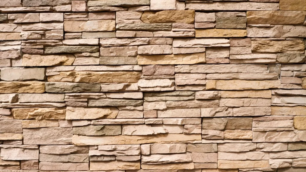 Natural stacked stone texture acting as a stylish wallpaper for wall tiles and accent features.